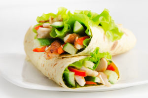 tortilla wraps with chicken  and fresh vegetables
